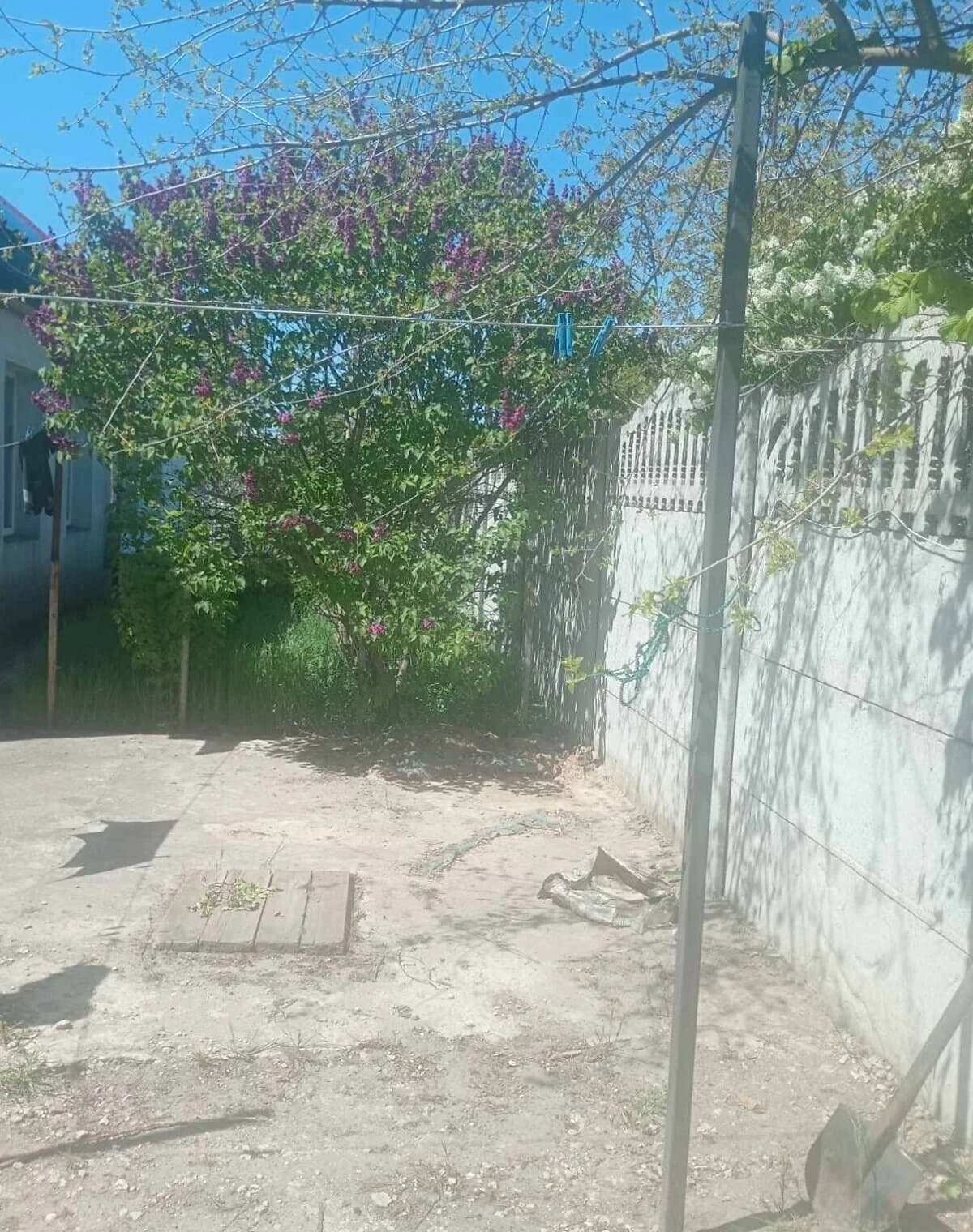 Частина будинку на вул. Шкільна: гараж із підвалом, город і сарай - фото 5