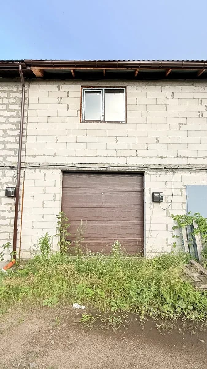 Два гаражі на ДВРЗ: підвал, поверхи по 28 м² - фото 1